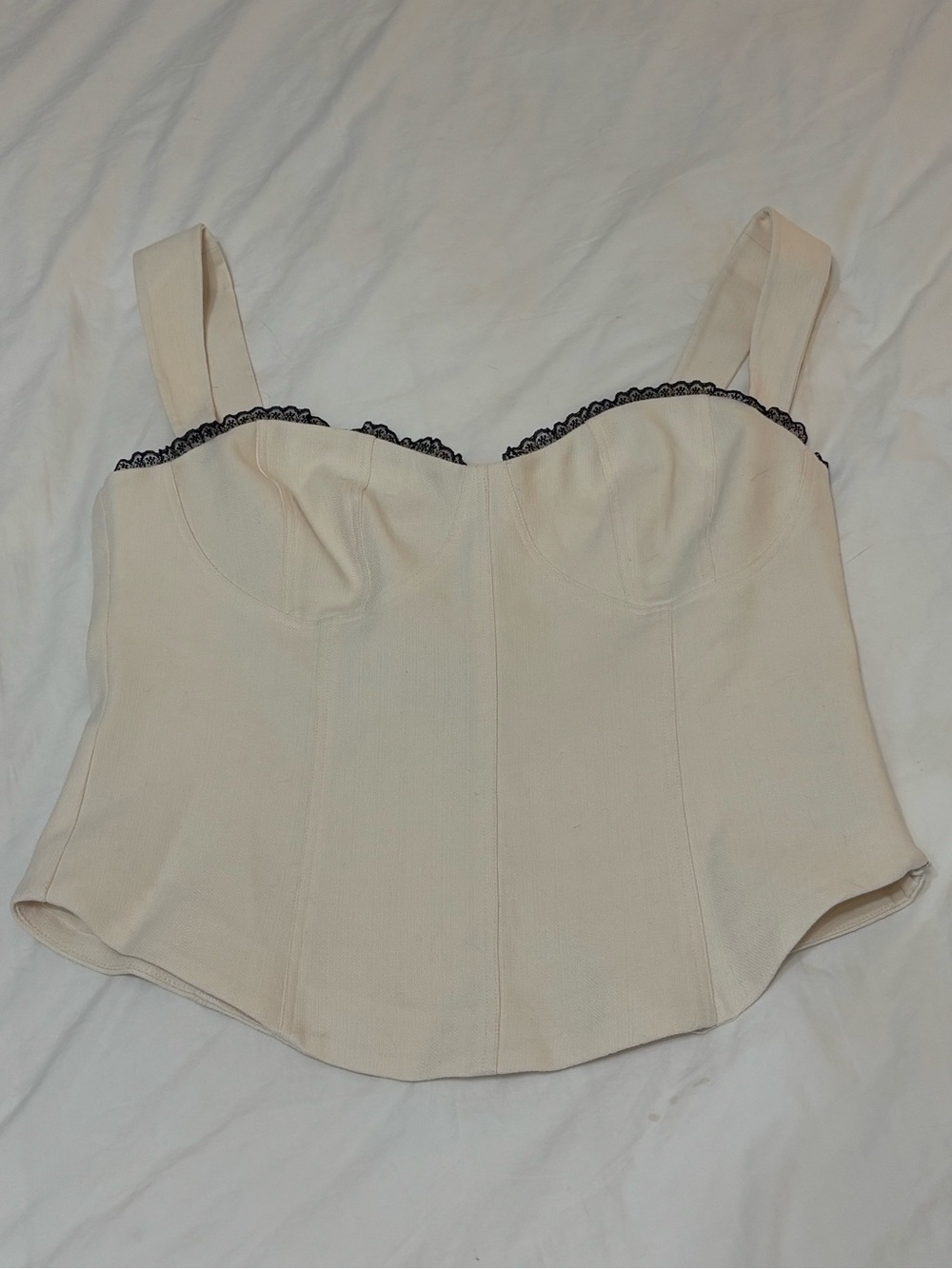Reformation cream corset-style top with black lace